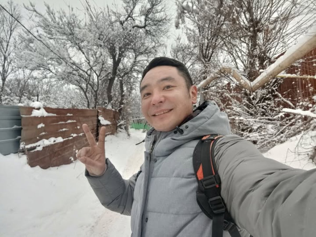 Чёрное авто и обыск: в Алматы задержали активиста Улана Шамшета