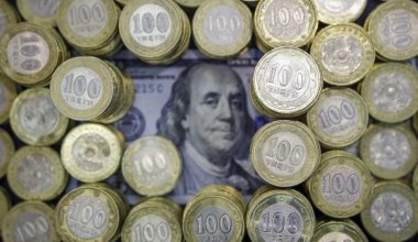 Тенге ослаб к доллару по итогам июня