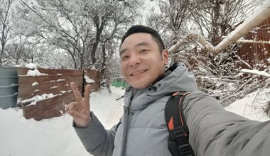 Чёрное авто и обыск: в Алматы задержали активиста Улана Шамшета